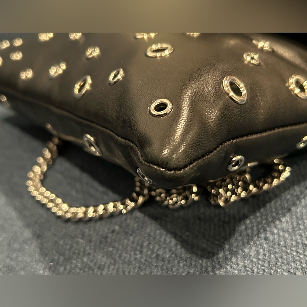 Henri Bendel's black/ silver grommet purse NWOT - Picture 9 of 10